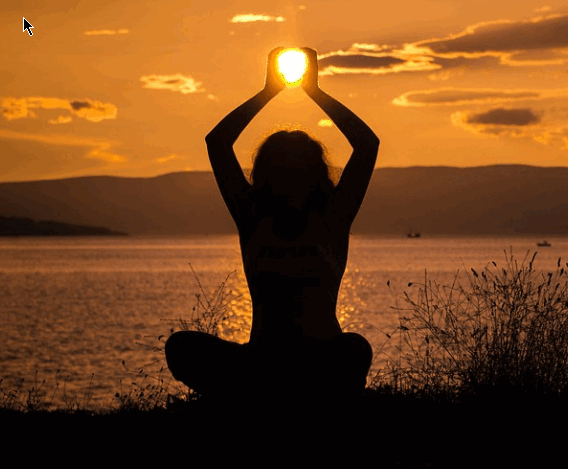 yoga girl holding the sun